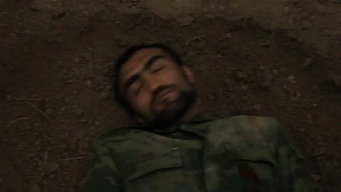 The soldier falls to the ground 3 Stock Footage 323017464