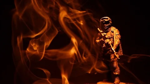 Soldier figure smoke dark background hd footage Stock Footage 100630153