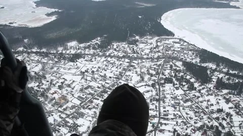 A soldier flying over a winter forest Stock Footage 158743422