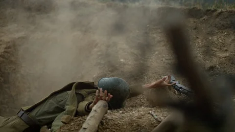 Soldier on the ground, slow motion Stock Footage 86462304