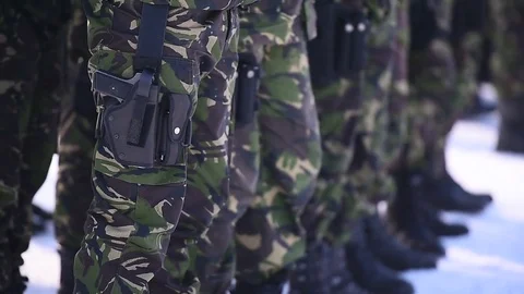 Soldier hand holding automatic machine gun during a military parade Vídeo Stock 72548845