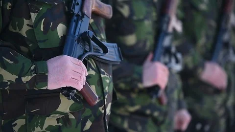 Soldier hand holding automatic machine gun during a military parade Stock-Footage 72548852