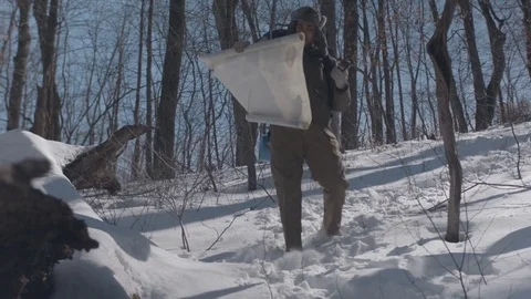 Soldier Hiking with Map in the Snow Winter Stock Footage 83564262