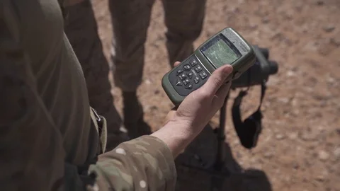 Soldier holding handheld computer during close air support exercise Stock Footage 106381886