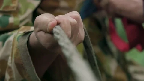 Soldier holding rope Stock Footage 77012973