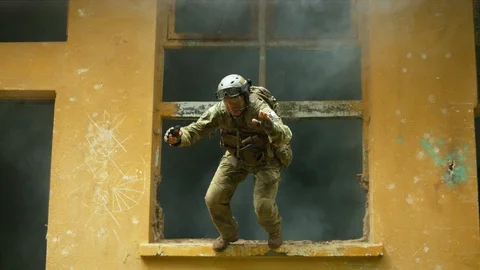 Soldier jumping, slow motion Stock Footage 86451073