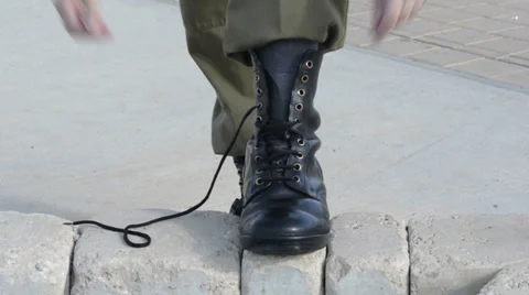 Soldier lacing boots Video stock 30442317