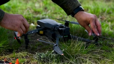 Soldier launches a drone Stock Footage 306548696