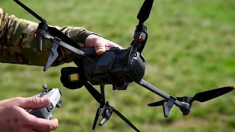Soldier launches a drone Stock Footage 320996830