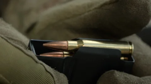 Soldier load ammo. Slow Motion in 4K (UHD). Stock-Footage 107124117