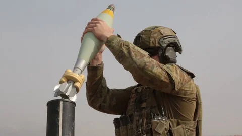 Soldier loading missile into mortar during a training - 2018 Stock Footage 106135766