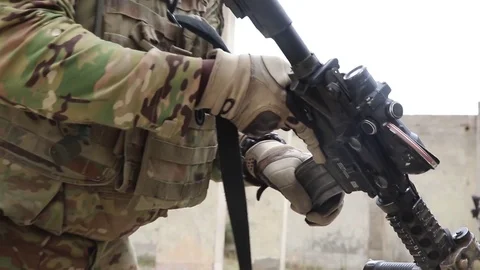 Soldier loading rifle during live fire exercise Stock Footage 93389324