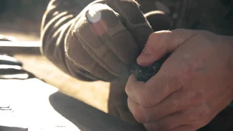 The soldier loads the clip Stock Footage 158743430