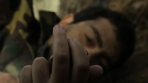 Soldier is look at the clock 2 Stock Footage 323015197