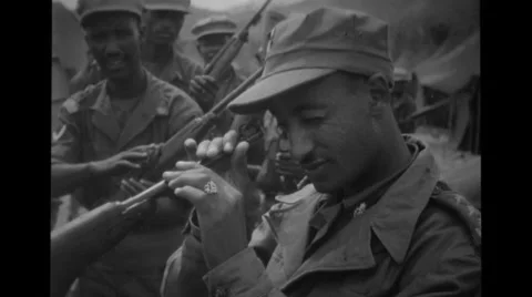 Soldier looking inside the rifle Stock Footage 36306155