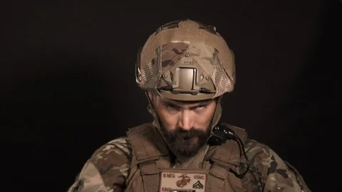 Soldier Looking Up Portrait On Black Stock Footage 116731409