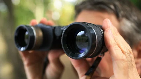 Soldier looking through binoculars Stock Footage 116489988