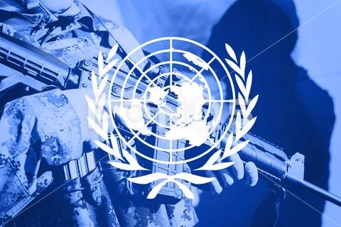 Soldier with machine gun with flag of United Nations Stock Photos
