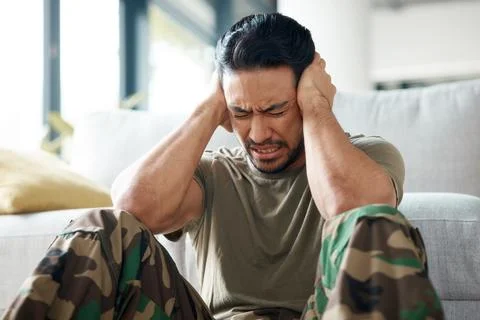 Soldier, man and stress, headache or PTSD of military trauma, remember pain and Stock Photos