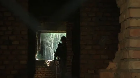Soldier Moves Through Abandoned Building* Stock Footage 115129727