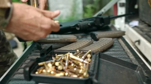 A soldier opens a box of ammunition. Video stock 108422188