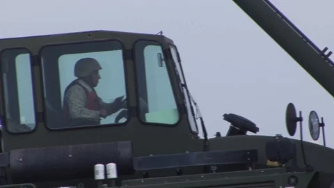 Soldier operates Kalmar RT240 Container Handler Video stock 110795100