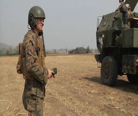 Soldier operating controls to load ammunition into HIMARS Vídeos de archivo 102944345