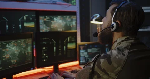 Soldier overseeing rocket launch on computer Stock Footage 116202120