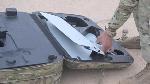 Soldier packing drone into protective carry case 動画素材 334314432