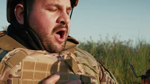 Soldier In Pain Looking For Direction On The Compass Stock Footage 310690720