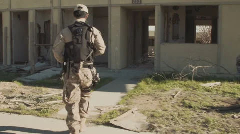 Soldier Patrolling Abandoned Complex Stock Footage 47923006