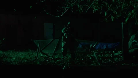 Soldier patrolling the perimeter at night Stock Footage 258470100