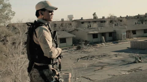 Soldier Patrolling Rooftop 3 Stock Footage 47923225