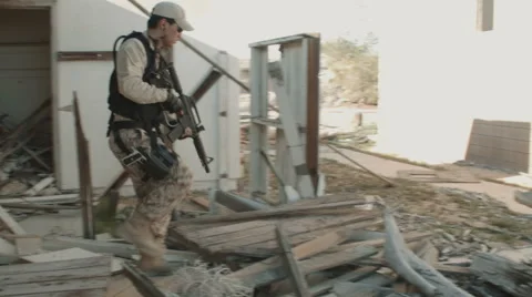 Soldier Patrolling Through Rubble Stock-Footage 47923235