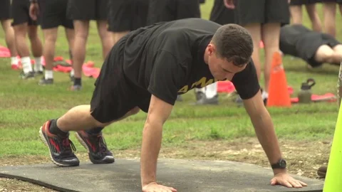 Soldier performing press-ups during Special Forces Selection exercise Stock Footage 98347682