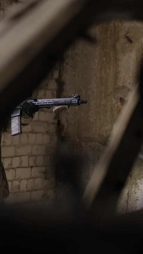 Soldier performing tactical shooting drill in abandoned building Stock Footage 333612788