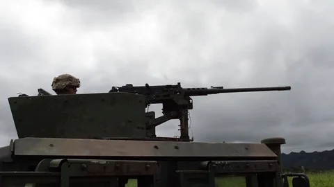 Soldier performs M2 machine gun training atop of their M115A1 HMWVVs - 2017 Stock Footage 84951106