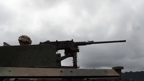 Soldier performs M2 machine gun training atop of their M115A1 HMWVVs - 2017 Stock Footage 84951120