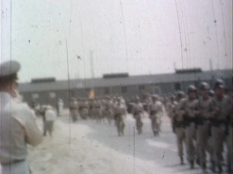 Soldier Platoon Marching Down Army Base Road - Vinatge 8mm Stock Footage 78924489