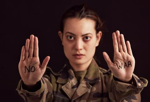 Soldier portrait and stop hands for war protest of asian woman with political Foto stock
