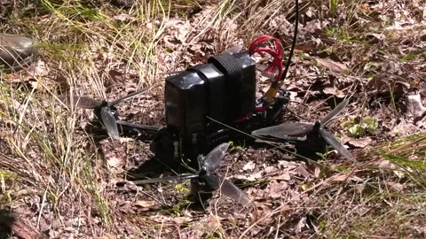 Soldier Preparing an FPV Drone for a Combat Mission Video stock 346525690