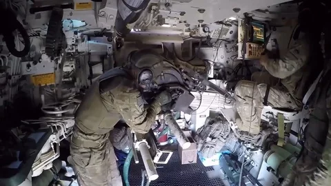 Soldier pulling trigger inside tank 動画素材 88042550