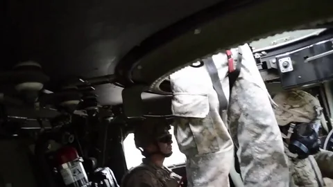 Soldier put bullets in ammo can, sitting inside M115A1 HMWVVs - 2017 Stock Footage 84951152