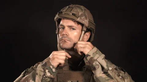 Soldier Puts Helmet Back On Ready For Battle Stock Footage 117204826