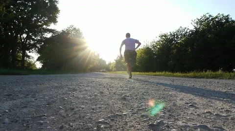 Soldier running on road 1 Video stock 10901487