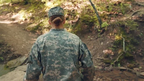 A Soldier Runs Through A Forest Stock Footage 87430018