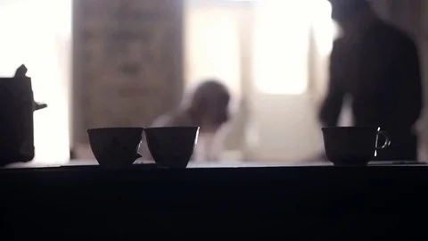 Soldier of the Russian army interrogates a suspect, an elderly man with a beard Stock Footage 100372640