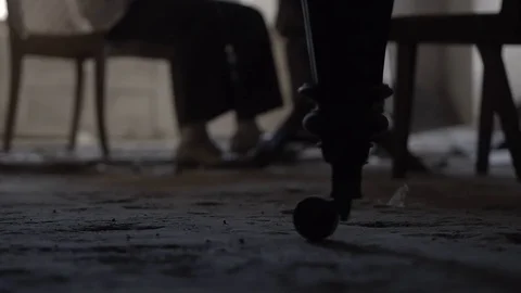 Soldier of the Russian army interrogates a suspect, an elderly man with a beard Stock Footage 100372672