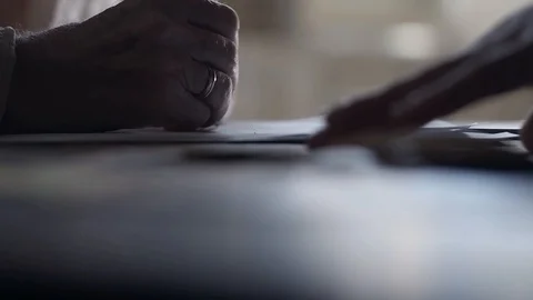 Soldier of the Russian army interrogates a suspect, an elderly man with a beard Video stock 100372753