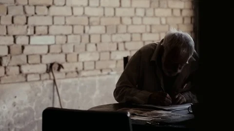 Soldier of the Russian army interrogates a suspect, an elderly man with a beard Stock Footage 100372865